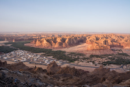 Rocky plateau with the village of Al Ula in the valley in Saudi Arabiaの写真素材