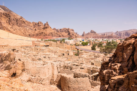 Ruins of the old city of Al Ula in Saudi Arabia with ancient stone buildings desert atmosphere and historical Middle Eastern heritage siteの写真素材