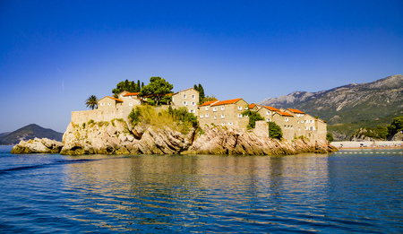 Luxury expensive vacation Sveti Stefan hotel on rocks, Mediterranean sea, Montenegroのeditorial素材