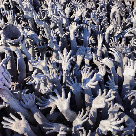 Hands of hell at Wat Rong Khun White Temple Chiang Raiの素材