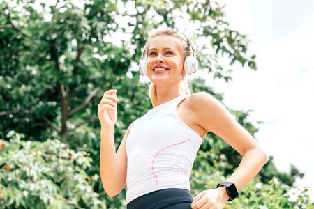 Running's my favorite. Fitness girl having workout outdoors