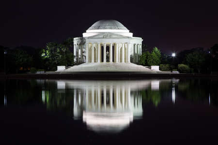 Washington, DC - Jefferson Memorial reflecting on the Tidal Basinの写真素材