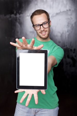Good Looking Young Nerd Smart Guy Man Using Tablet Computerの写真素材