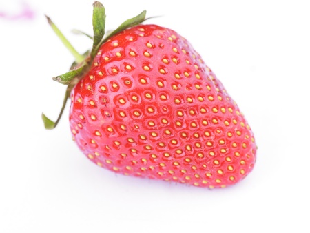 One Red Strawberry Fruit On White Backgroundの写真素材