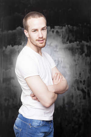 Good Looking Man in white shirt and jeansの写真素材