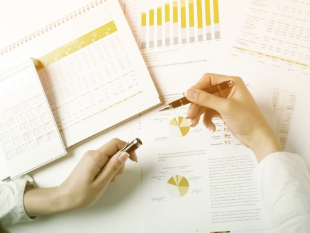 Market Analyze - pen and numbers on paperの写真素材