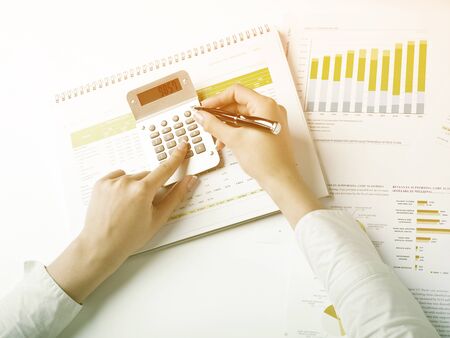 Market Analyze - pen and numbers on paperの写真素材