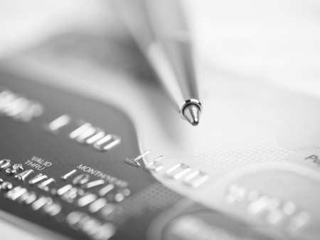 Close up a credit card and penの写真素材