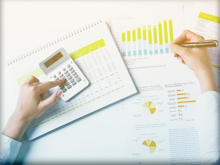 Market Analyze - pen and numbers on paperの写真素材