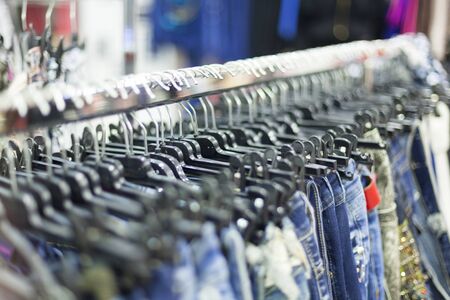 Clothes Rack With Jeans- Clothing Store Detailの写真素材