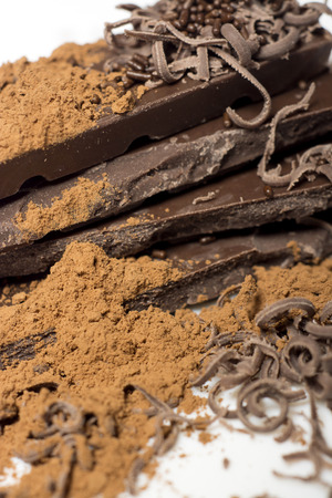 Parts of dark chocolate on the tableの写真素材