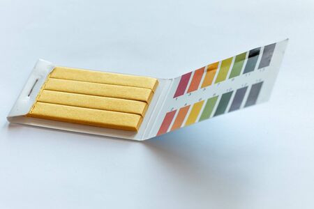 Universal Litmus pH test and color scale on whiteの写真素材