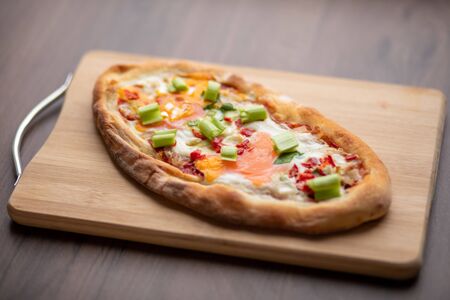 Quick food meal - Egg beacon cheesee pizzaの写真素材
