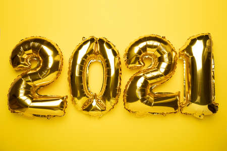 2021 concept new year from golden foil balloon stock photoの写真素材