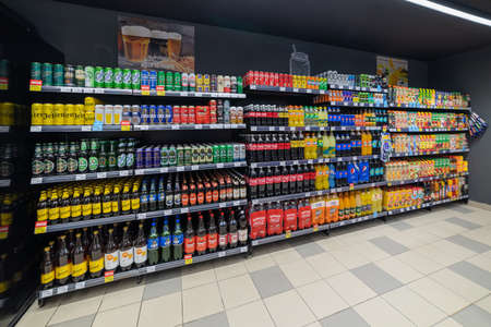 Valjevo, Serbia - Mart 4, 2022 - Beer nad drinks shelf in modern Local Supermarket Storeのeditorial素材