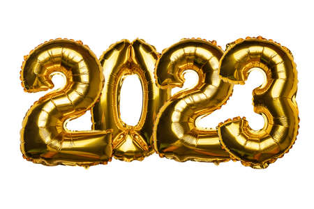 2023 concept Happy New Year from golden foil balloons aranged tight on white backgroundの写真素材