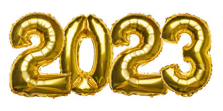 2023 concept Happy New Year from golden foil balloon on yellow backgroundの写真素材