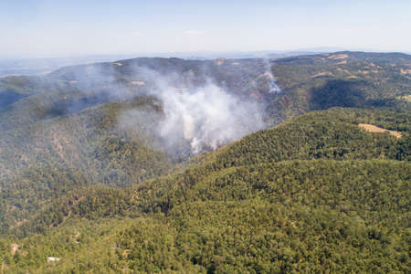 Aerial view of Wildfire on mountain forest, fire on Divcibare, drone view, Serbiaの写真素材