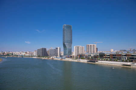 Skyscaper Belgrade Tower in Belgrade Watefront, modern residential area on the river bank of Sava river, City Center from Gazela Bridgeの写真素材