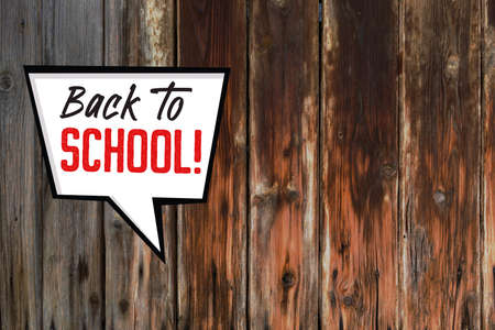 Back to School title on Retro Dark Wood structure backgroundの写真素材