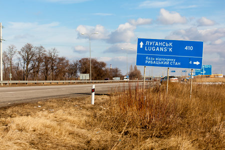 Dnepropetrovsk, Ukraine - February 7, 2016: A road sign with the words: Lugansk
Photography has been taken during driving, some motion blurのeditorial素材
