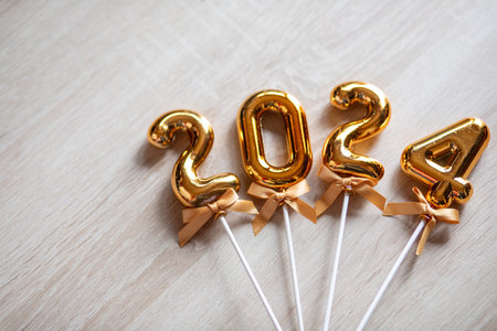 Happy New Year 2024 concept - Orange foil numbers stock photoの写真素材
