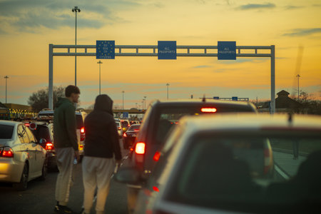 Horgos Roszke, Hungary - February 17, 2025: Long Queue of Pasengers Cars Stuck at EU Border Entrance...