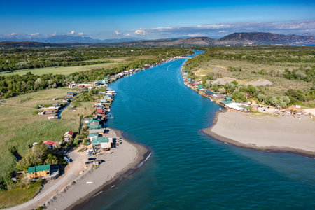 Bojana River flows into the Adriatic Sea, Ada Bojana, longest beach in Montenegroの写真素材