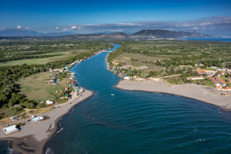 Bojana River flows into the Adriatic Sea, Ada Bojana, longest beach in Montenegroの写真素材