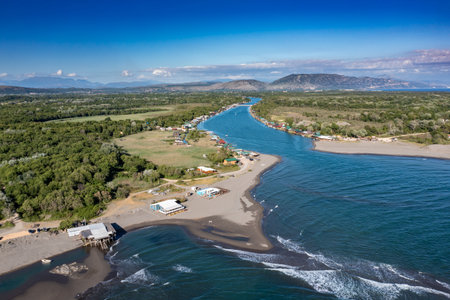 Bojana River flows into the Adriatic Sea, Ada Bojana, longest beach in Montenegroの写真素材