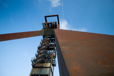 Rusty parts and fragments from a disused mine