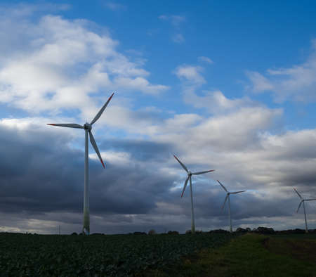 Landscape with electricity windmills in the sky