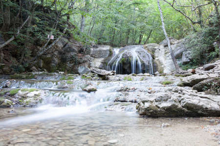 beautiful forest falls in mountains in the summer afternoon, the Crimea, Russiaの写真素材