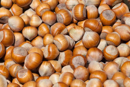 the background consisting of a set of small beautiful nuts