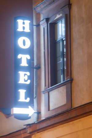 Hotel sign illuminated at night in Sankt-petersburgの写真素材