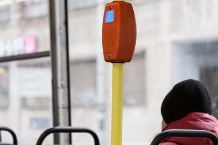 Clsoe the point of view of the reader of the ticket onboard the tram in Europeの写真素材