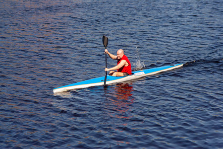 ST. PETERSBURG, RUSSIA - MAY 12 2018: the athlete trains on kayak. In Russia, many people are...