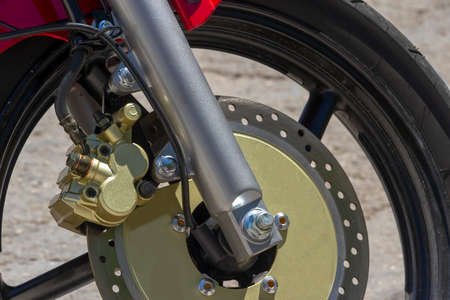 brake disc on motorcycle front wheel together with brake device