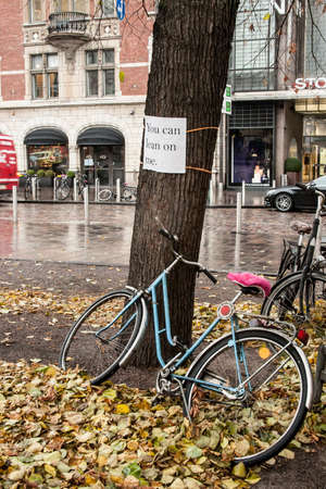 Helsinki,Finland-October 25,2016:parked bicycle on a street in Helsinki. In Finland, bicycle transport is very popular.のeditorial素材