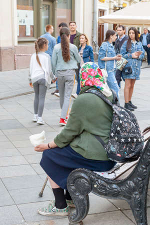 Moscow, RUSSIA - May 04 ,2018:The poor man on the street of Moscow. Some people have an income level much less tha living wage.のeditorial素材