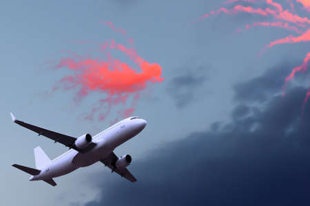 passenger plane takes off in a beautiful sunset sky in summer