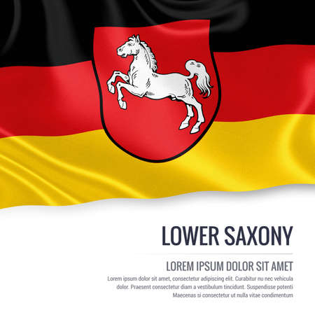 Flag of German state Lower Saxony waving on an isolated white background. State name and the text area for your message.の写真素材