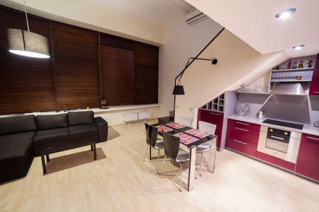 Evening in modern and cozy loft type flatの写真素材
