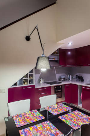 Evening in modern and cozy loft kitchenの写真素材