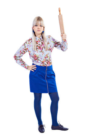 Beautiful girl holding rolling-pin isolated on a white backgroundの写真素材