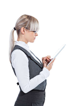 Portrait of elegant business woman with tablet computer on white backgroundの写真素材