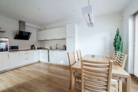 Inside of a modern kitchen with minimal furnitureの写真素材