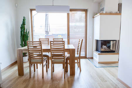 Inside of a modern kitchen with minimal furniture
