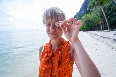 Young woman looking on a beach in Philippines