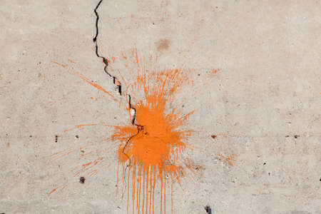 Old wall with paint splashの写真素材